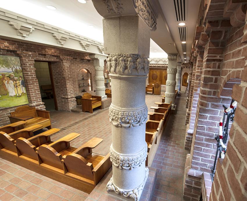 The Indian Nationality Room mimics a university courtyard in Nalanda. The pillars are decorated with rosettes and fruit.