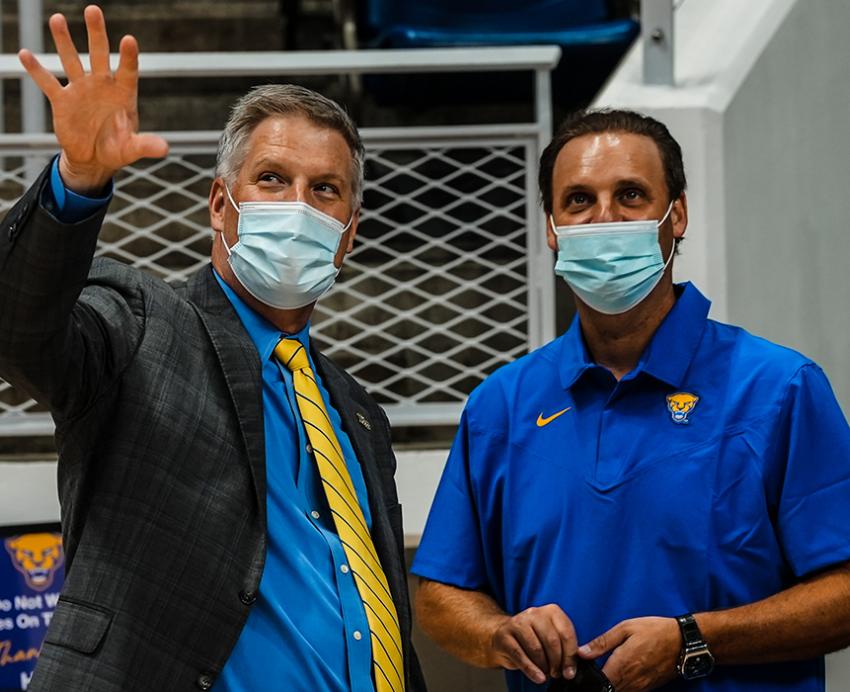 Patrick Gallagher and Chris Bickell, wearing masks