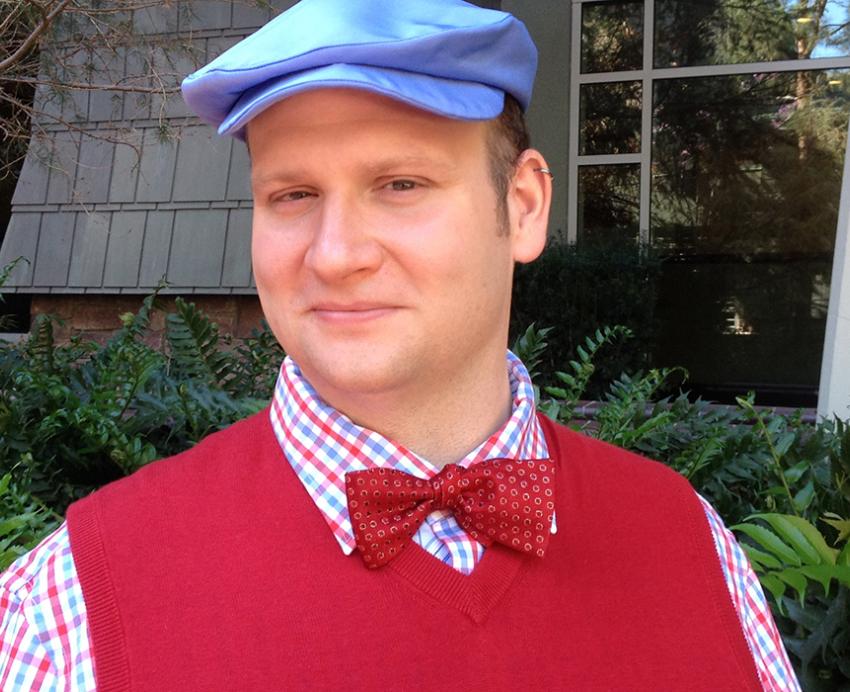 Ricky Lyle Campbell wearing blue hat, red vest and red bowtie.