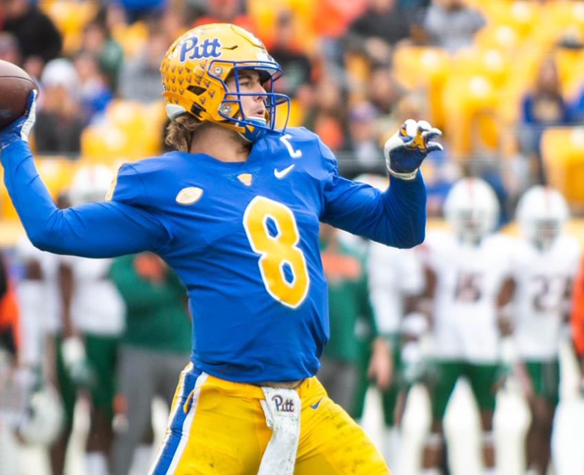 Kenny Pickett throwing ball during football game