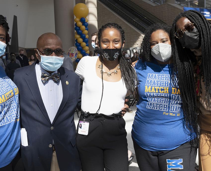 Pitt students posing with each other outside on Match Day