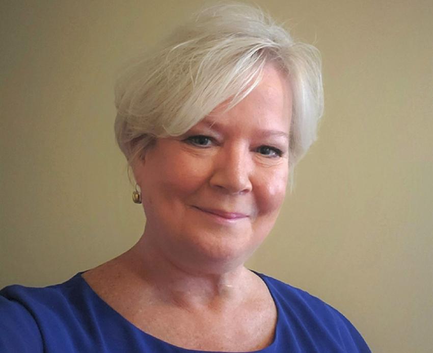 Maureen Pastin wearing blue shirt