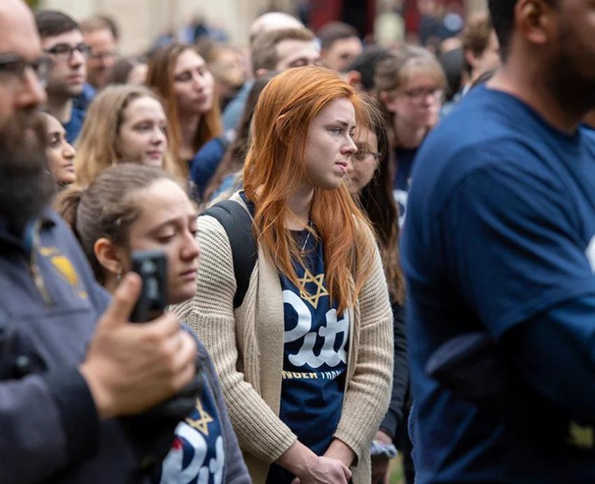 A crowd of people standing together