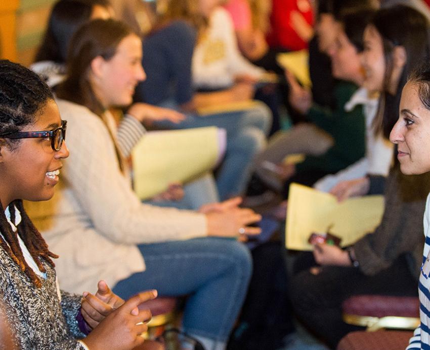 students talking at a speed "friending" event