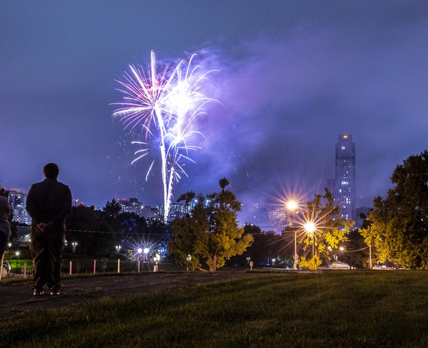 fireworks in oakland with cathedral in background