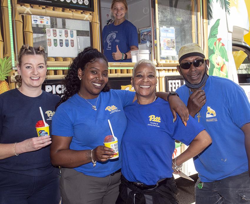 four people in Pitt shirts at an ice cream truck