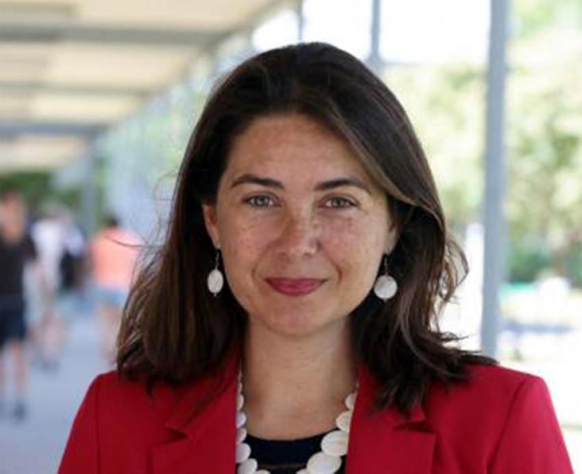 a woman in a red blazer
