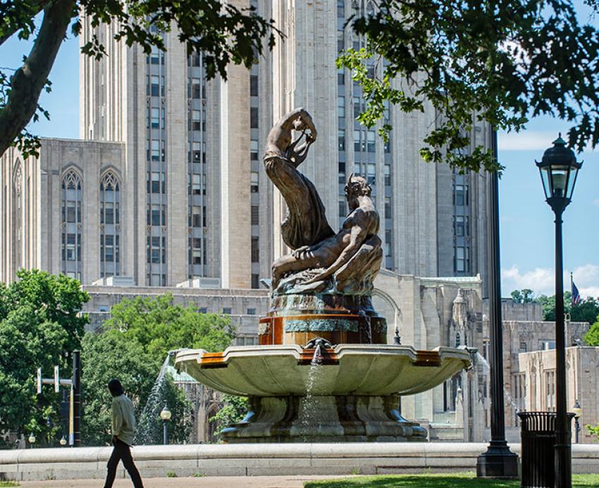 a statue in front of the Cathedral