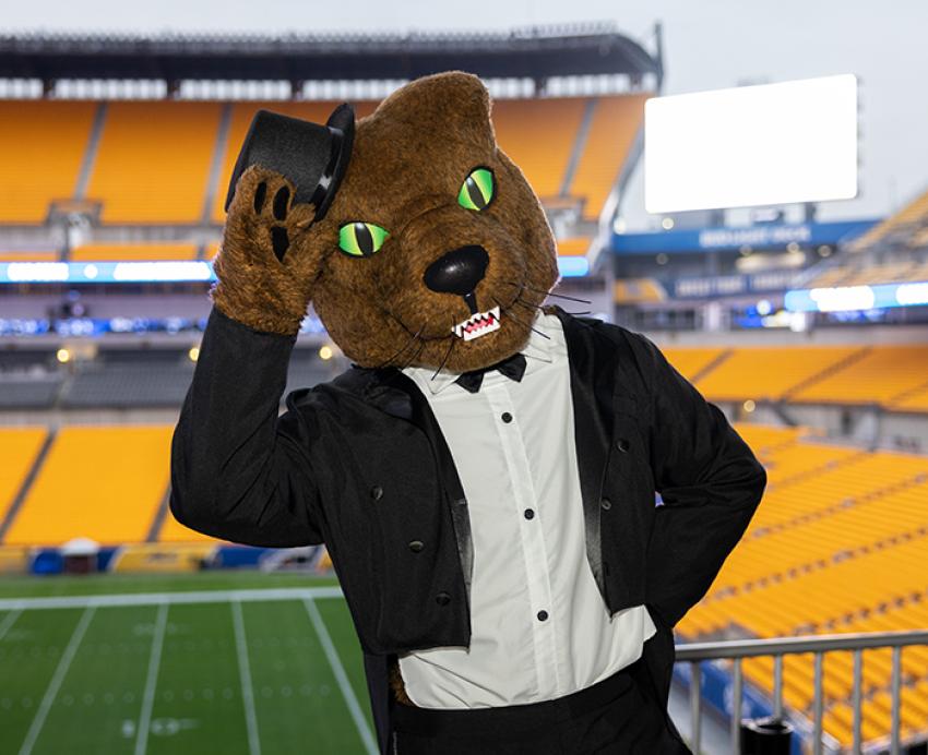 Roc in a tux and top hat