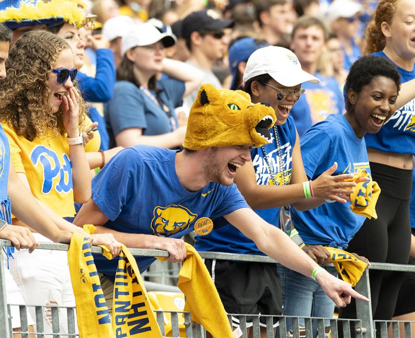 student fans cheer at the stadium