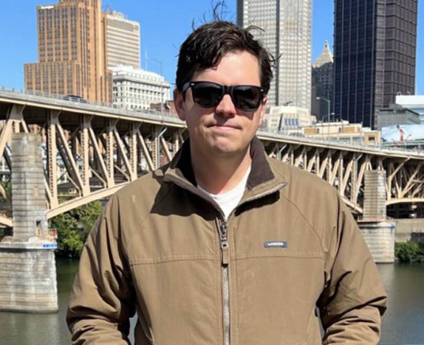 Burgess at a riverfront