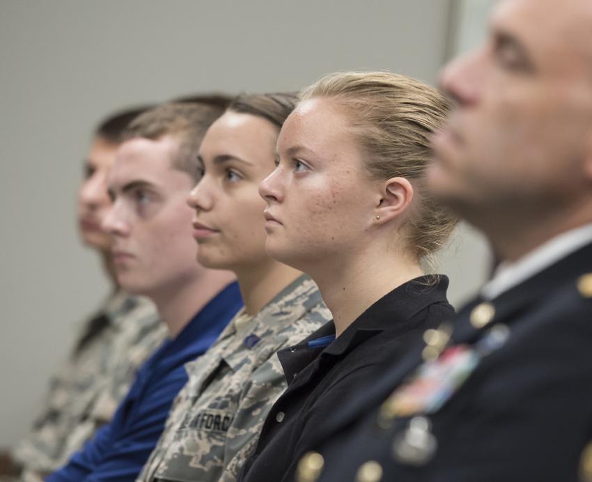 a line of people in military uniforms
