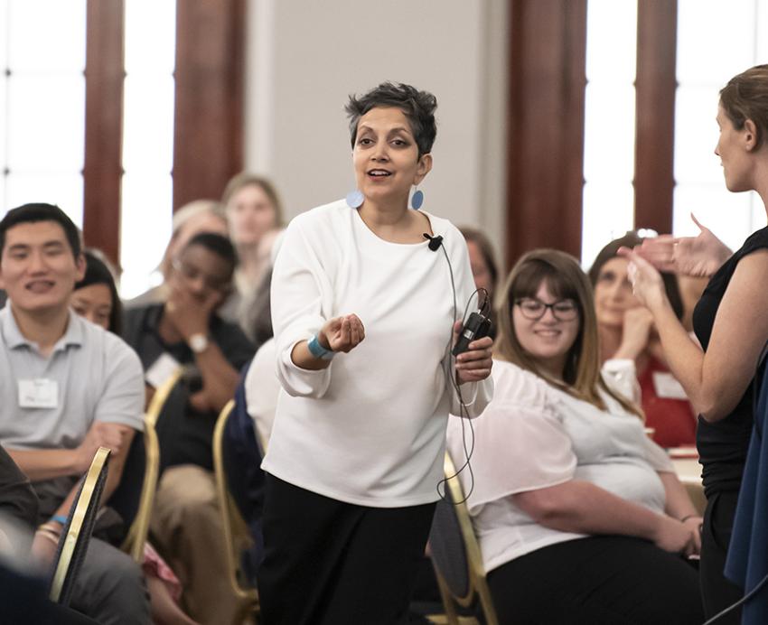 Patel speaking to an animated crowd