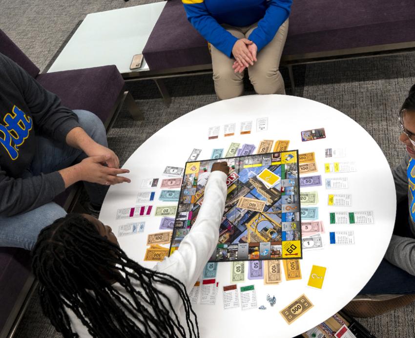 four students playing the new game