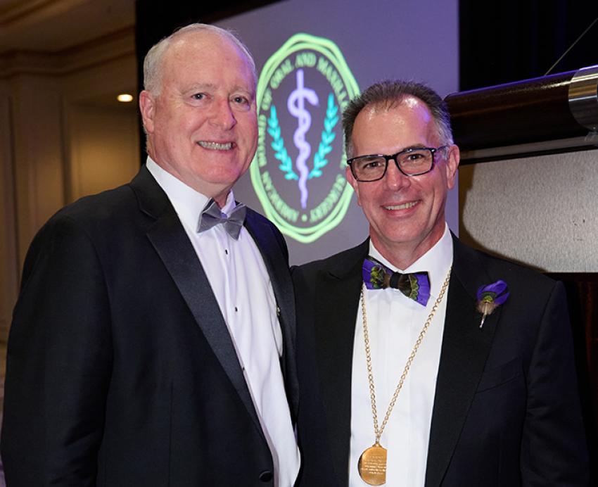 two men in tuxedos
