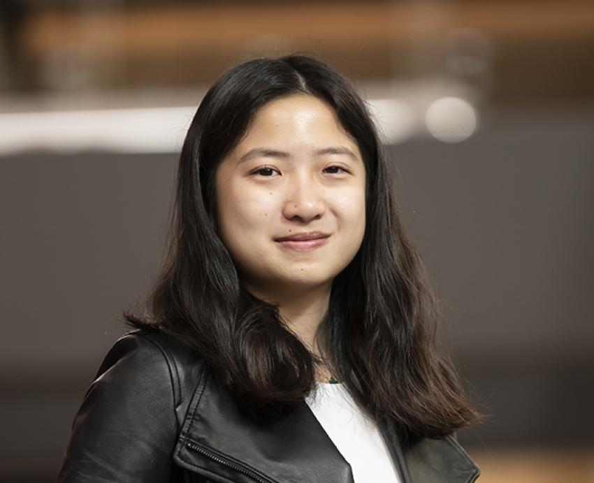 Isabel Lam in a white shirt and black leather jacket
