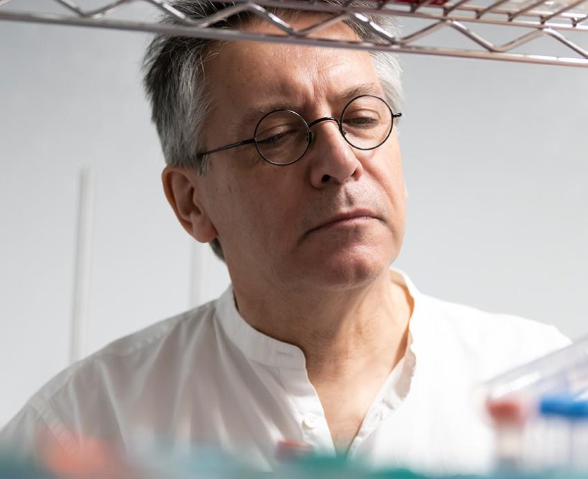 Graham Hatfull looks at a plastic tube
