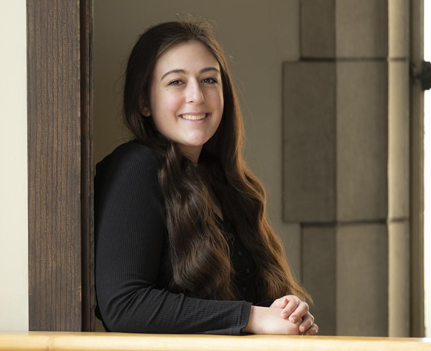A portrait of Grace Fluery in a black shirt