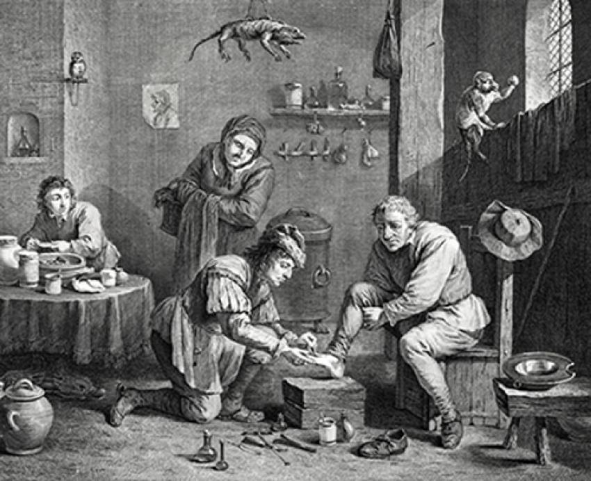 A man has leeches placed on his foot in this vintage illustration