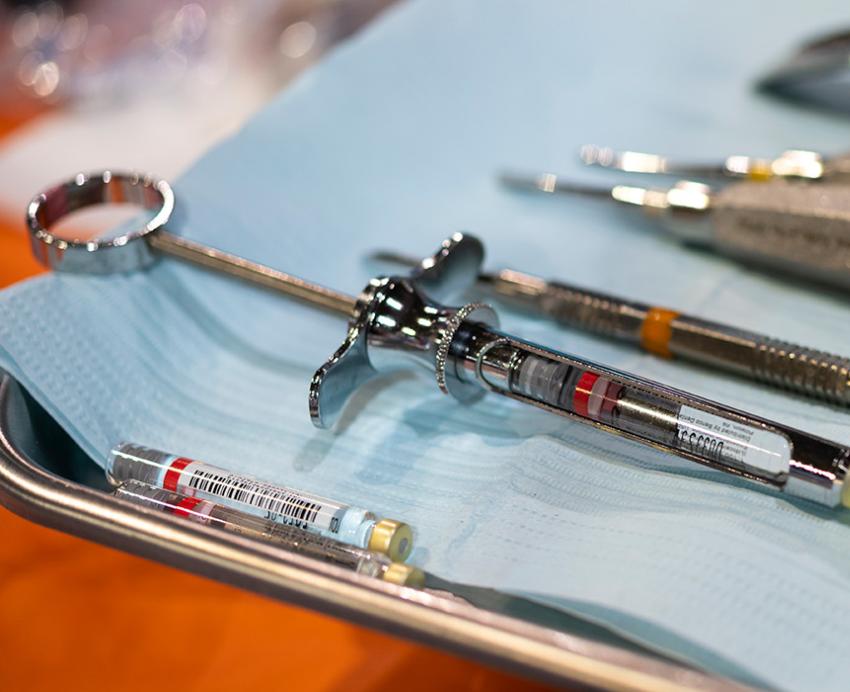 Dental tools on a silver tray