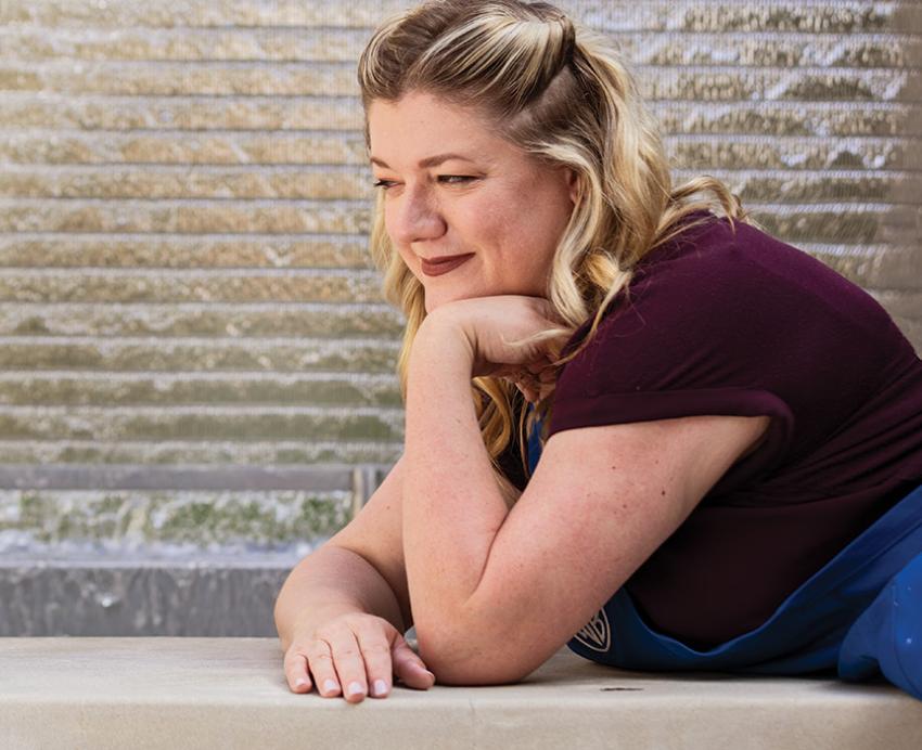 Darcy Prevost gazes at a miniature cottage she built
