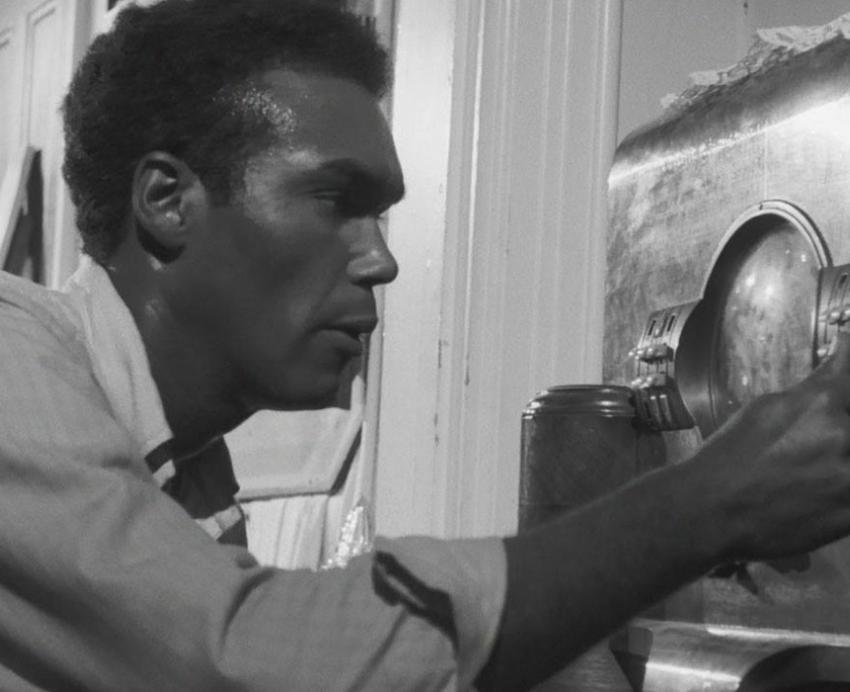 Jones fiddles with a radio in 'Night of the Living Dead'