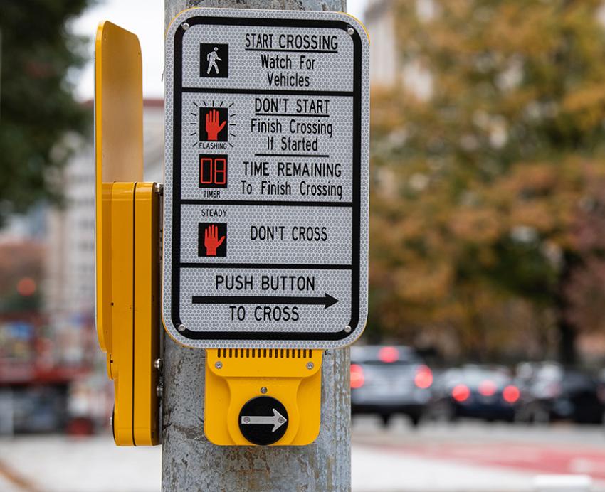 A button at a crosswalk