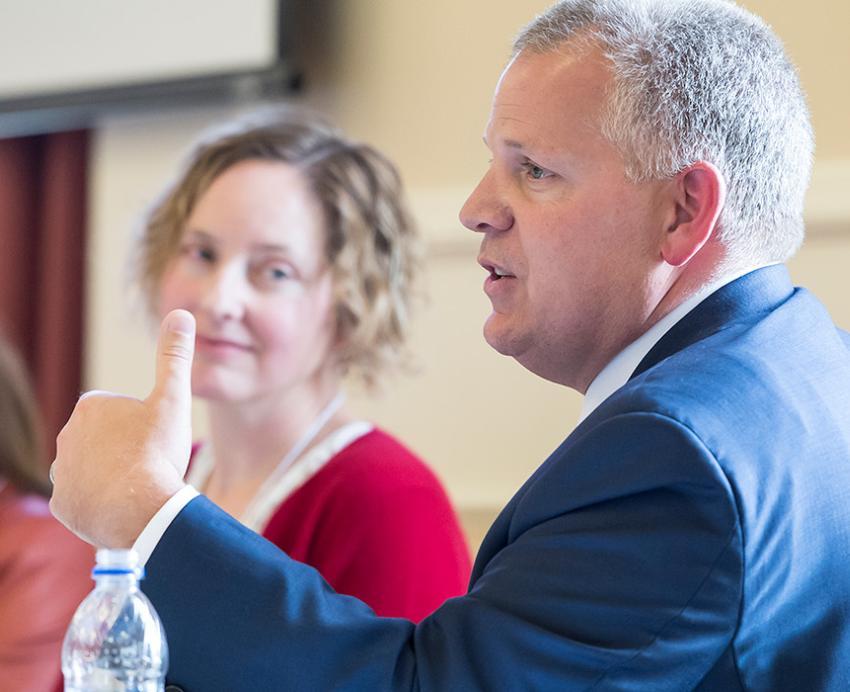 McCarthy speaks on a panel