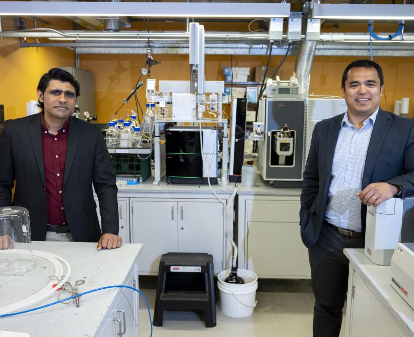 Left to right, Sustainable Design Labs researchers Hassan Nawaz and David Sanchez pose for a portrait in their lab.
