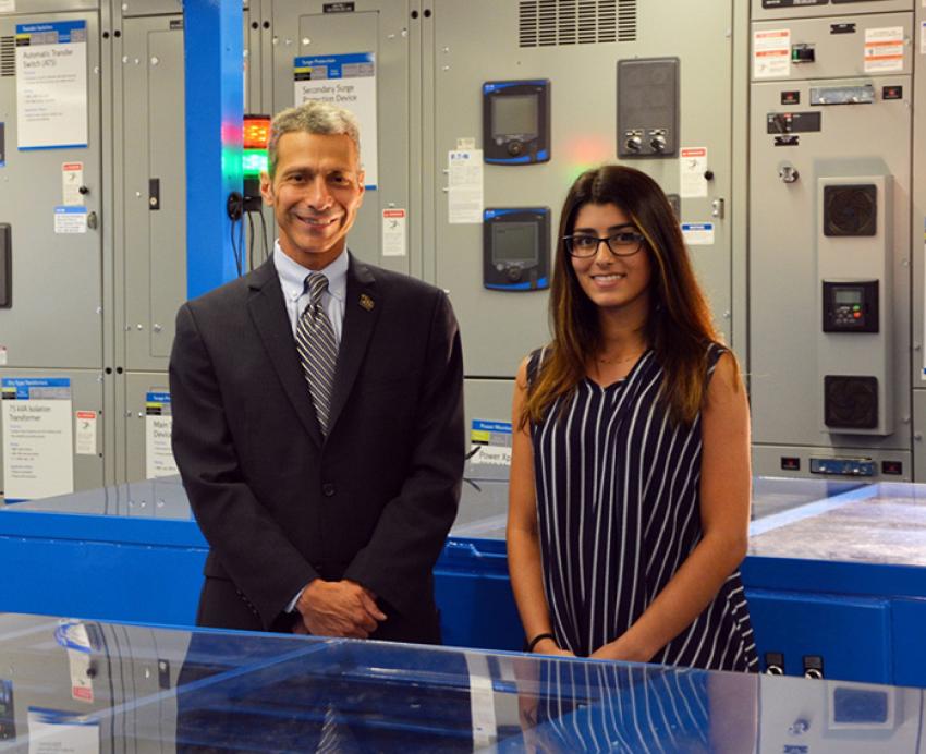 Gregory Reed and Nakhai in a lab