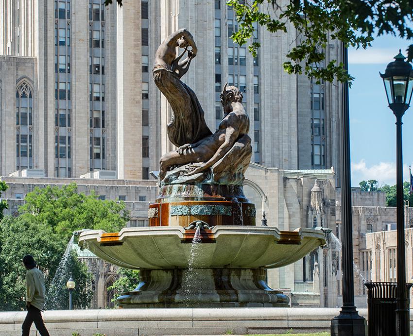 Water fountain on Pitt's campus, with Cathedral of Learning in the background