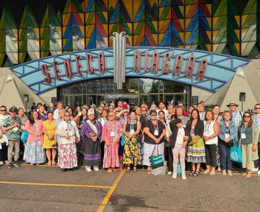 Attendees and volunteers of the World Indigenous Suicide Prevention Conference in Niagara Falls, New York, pose for a portrait.