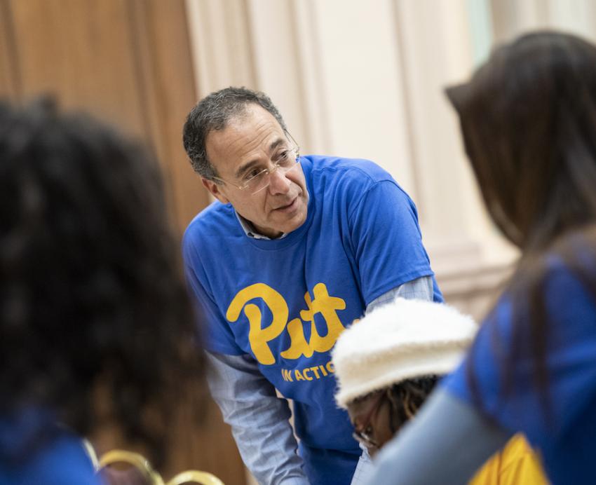 Man wearing Pitt shirt.