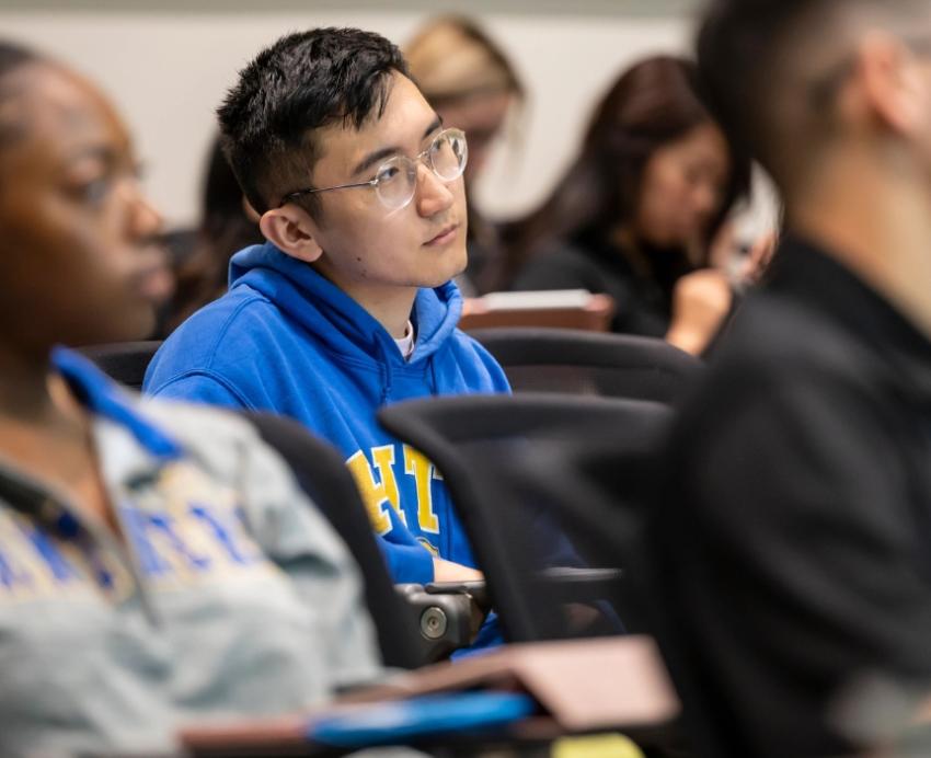 School of Pharmacy students attend a lecture in the Salk Pavilion.