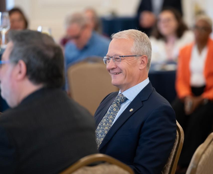 Dave DeJong smiles during a recognition ceremony by Pitt's Board of Trustees.