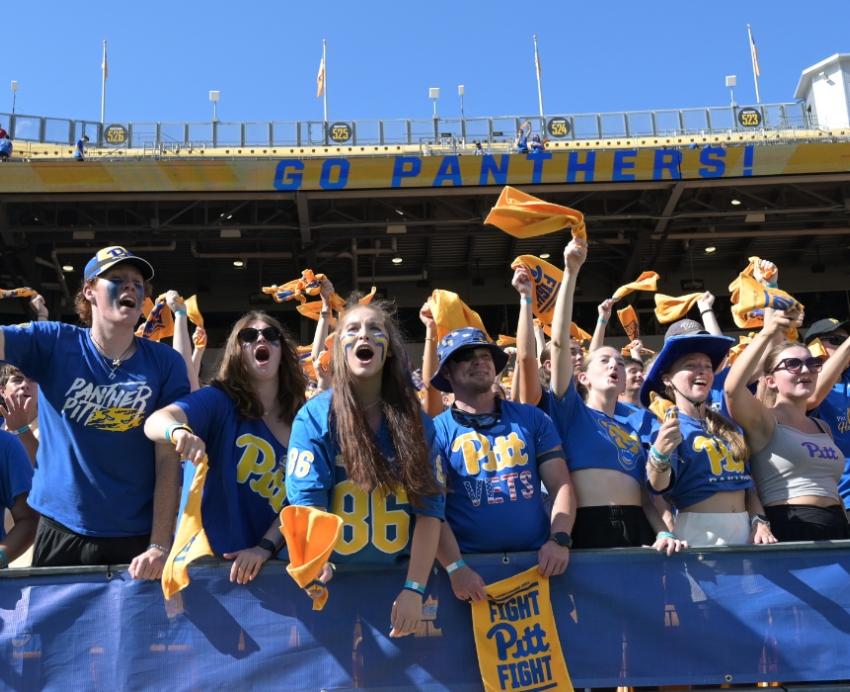 Pitt fans cheer during the Homecoming Football game.
