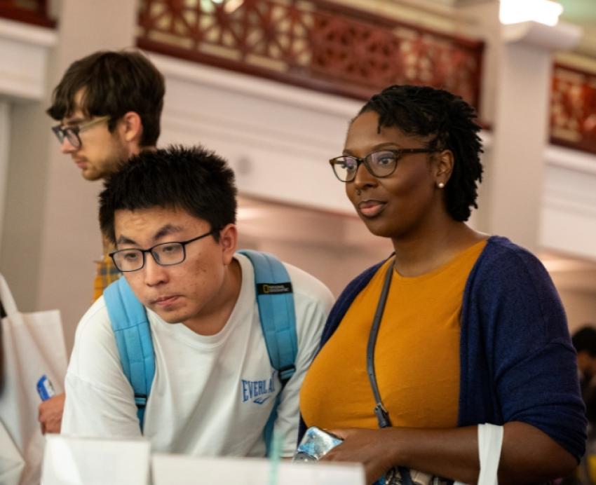 Prospective students attend a graduate studies orientation.