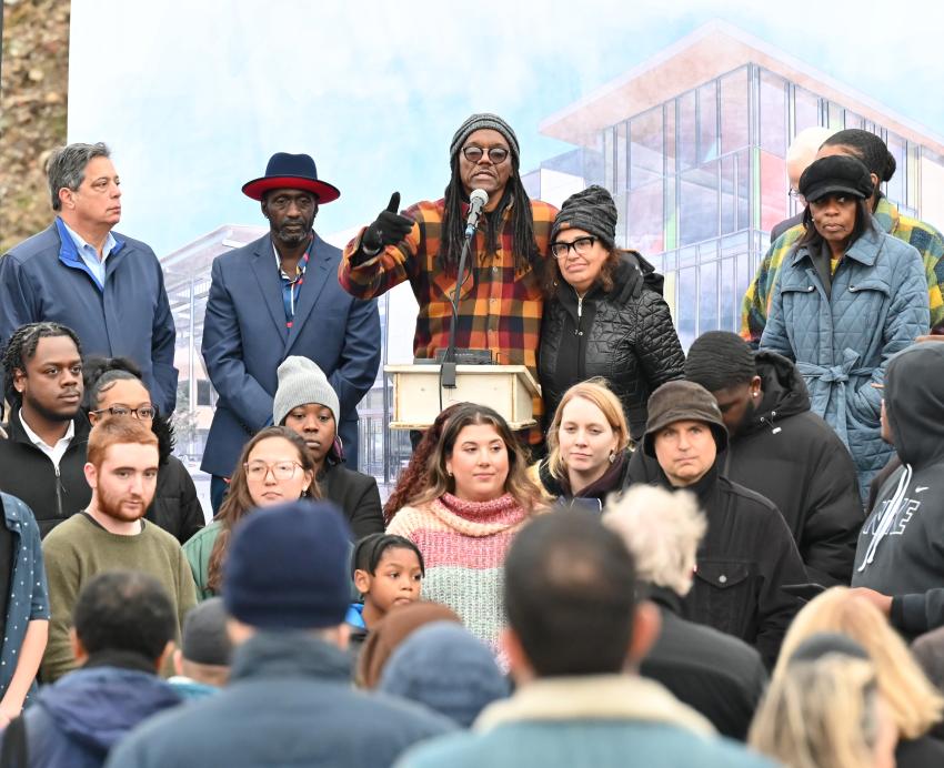 Community and Pitt speakers gather to speak to a crowd at an event at t at Hazelwood Avenue and Lytle Street, where it was announcement about the Hazelwood CEC was made.