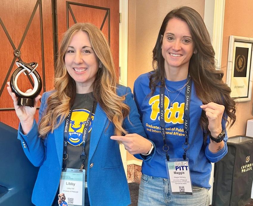 AMA award winners Libby Hilf and Maggie Rehberg pose in Pitt swag with their award