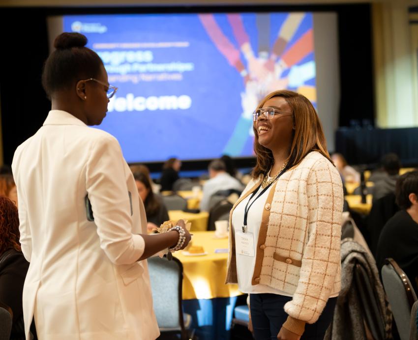 Participants engage with one another during the Community Engaged Scholarship Forum.