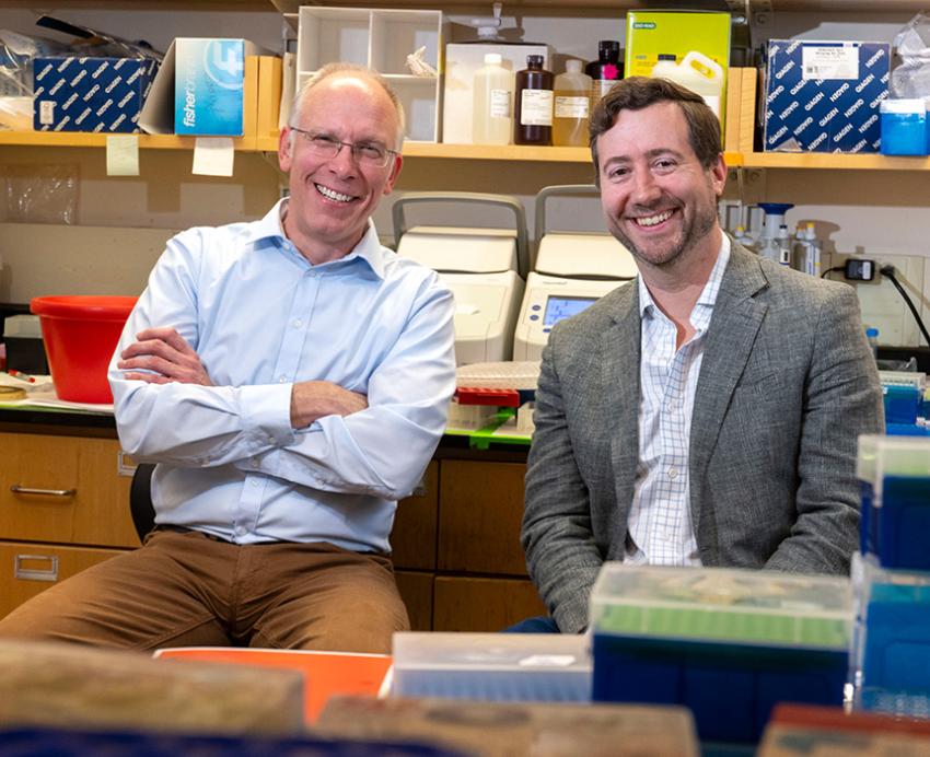 Alexander Deiters and Jason Lohmueller in the lab