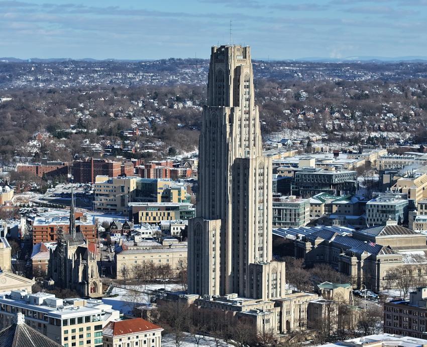 Winter drone imagery of the Cathedral of Learning and campus.
