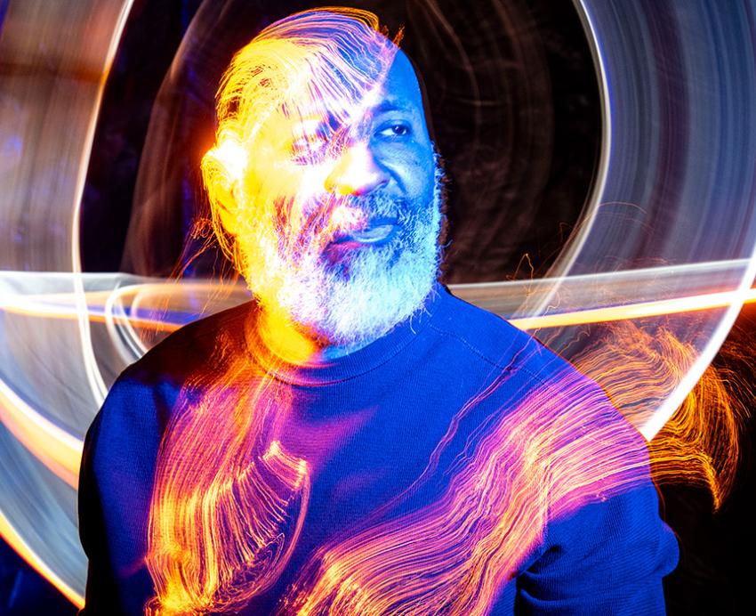 A portrait of Jackson with illustrated light effects