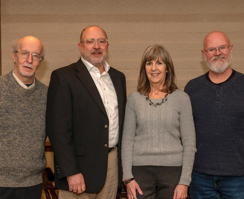 Group portrait of Pitt-Bradford faculty and staff members Bill Kline, David Soriano, Karen Strotmann, and Bob Dilks, who, along with 12 others, were honored for combined service that totals 366 years.