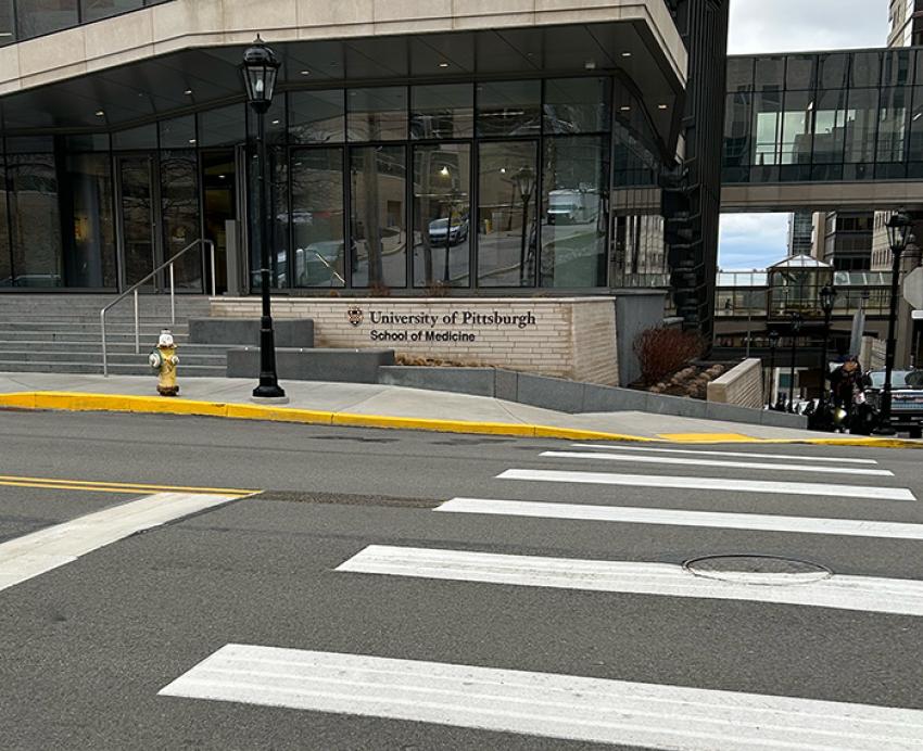 A crosswalk near the Scaife Hall entrance