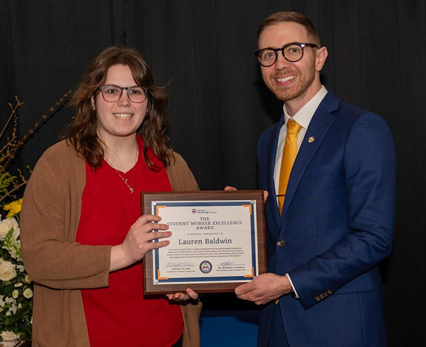 Lauren Baldwin receiving award
