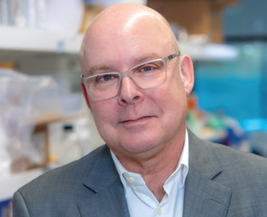 Headshot of a man inside a medical lab