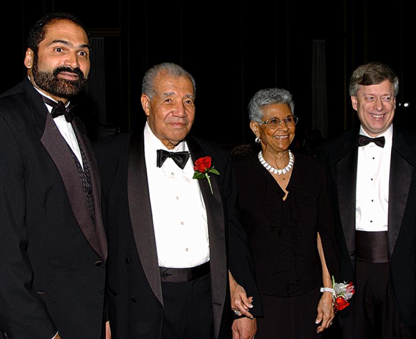 The Robinsons stand with Franco Harris and Mark Nordenberg.