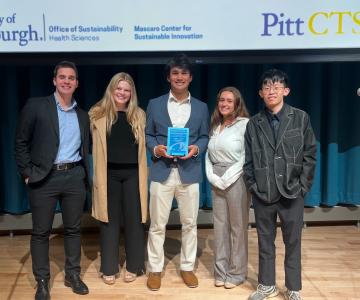 Recipients of the student award, William Schuck and his teammates Max Chiang, Marissa Varshine, Peter Vassil and Ellie Velasquez smile for a group portrait.