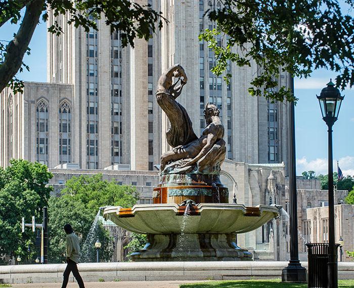 a statue in front of the Cathedral